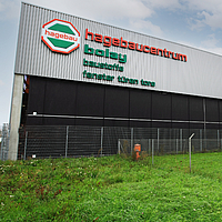 Pavilhão industrial: Centro Hagebau com cobertura têxtil e zona de carga